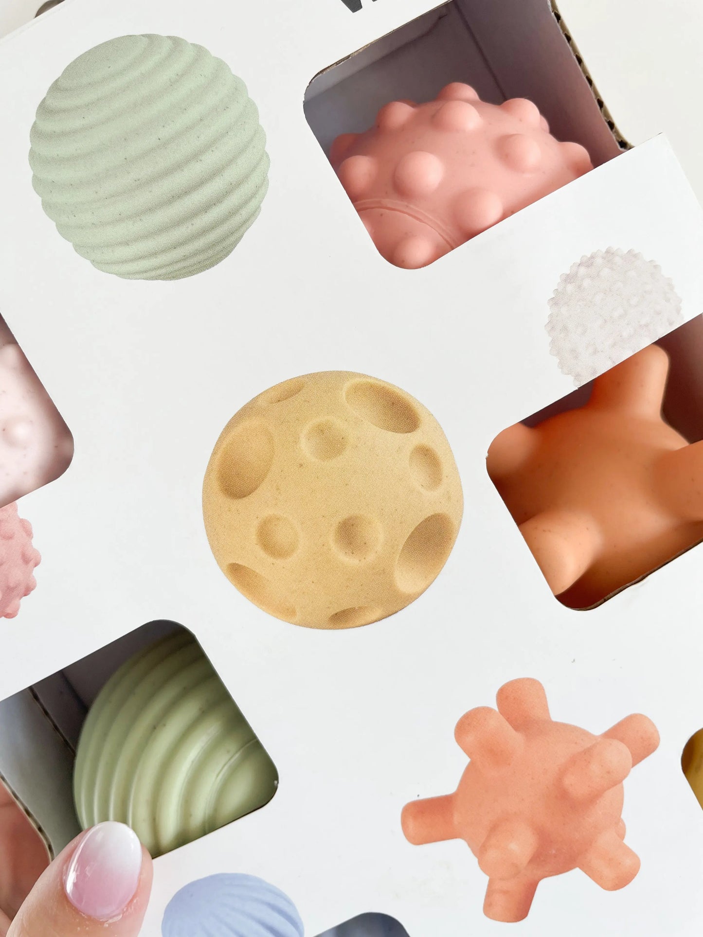 Balles sensorielles colorées en silicone – vue rapprochée des textures variées