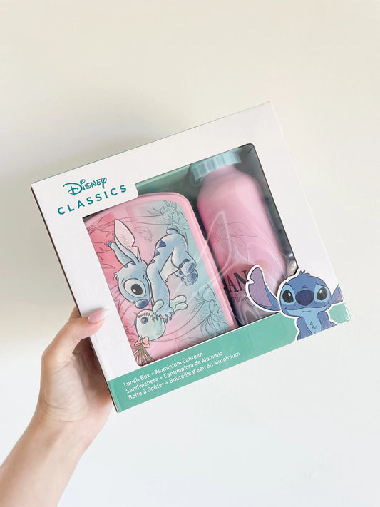 Gourde stitch disney et boite a gouter disney rose pour fille. Coffret cadeau. Gourde et boite a gouter stitch dans un jolie packaging. photo prise dans la main sur fond blanc